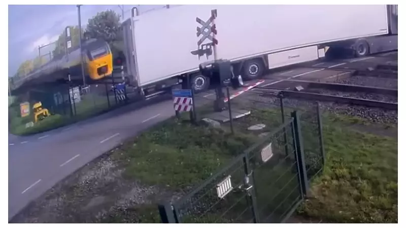 Shocking CCTV Captures Heart-Stopping Moment Train Smashes Into Lorry at Dutch Level Crossing