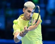 Alcaraz Triumphs Over Fritz in Thrilling ATP Finals Opener