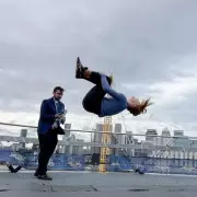 Ex-Gymnast Breaks Backflip Record on O2 Arena Roof