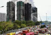 Hong Kong Fire Death Toll Hits 44 as Police Arrest Construction Firm Staff