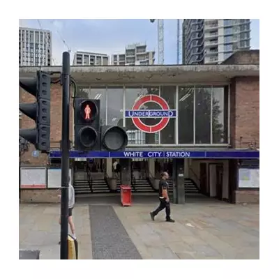 Manhunt after children kicked at White City Tube station