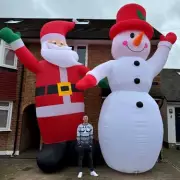 Dad-to-be's 20ft Christmas inflatables spark poison pen letter from neighbour