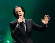 Nick Cave's Veiled World: A Deep Dive into Faith, Grief and Music