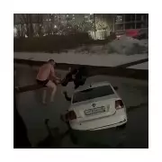 Heroic Trio Saves Boy from Sinking Taxi in Icy Dagestan Canal