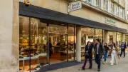 Next Nears Deal to Acquire Russell & Bromley with Retail Realisation