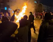 Trump Warns Iran Over Protest Crackdown as Deepfake Threat Grows