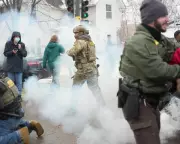 Trump's Davos Peace Charter Signing Amid Domestic Immigration Crackdown