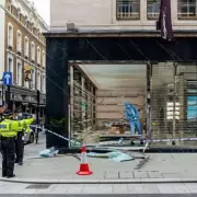 Two Men Charged After SUV Rams Luxury YSL Store in Central London Burglary