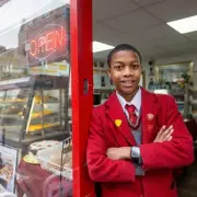 UK's youngest entrepreneur, 13, funds £4k-a-term school fees with Caribbean food shop