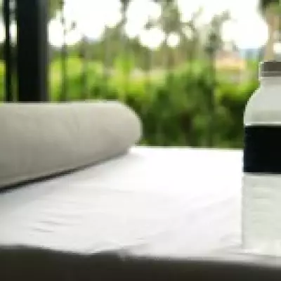 Flight Attendant's Hotel Safety Hack: Why You Should Toss a Water Bottle Under the Bed