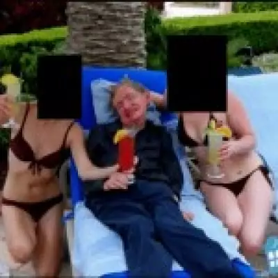 Stephen Hawking Seen in Epstein Files Sipping Cocktails with Bikini-Clad Women