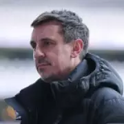 Gary Neville Clashes with Arsenal Fans Over 'Desperate' Tottenham Commentary