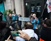 Green Leader Joins Protest Against Palantir UK Contracts Amid Transparency Fears