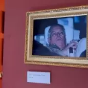 Louvre Prank Activists Reveal How They Hung Andrew's Arrest Photo