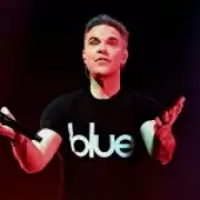 Robbie Williams' Intimate Tour Reveals Vulnerability Beyond Epstein Jokes