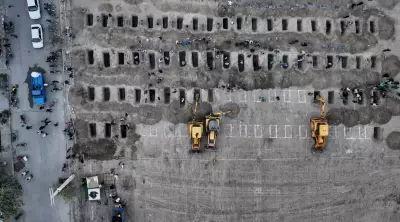 Global Lens: Mourning in Iran, Holi in India, and Global Snapshots