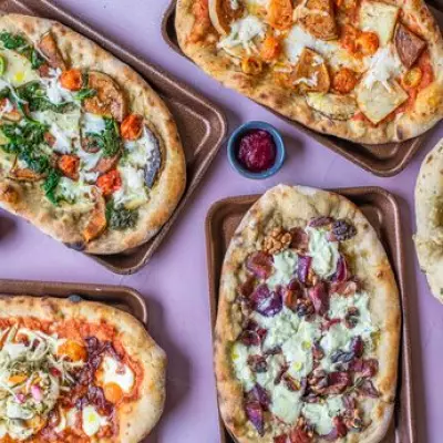 London's Award-Winning Flat Earth Pizzas Closes Due to Soaring Costs and Taxes