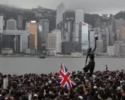 China Uses Financial Tactics to Coerce Exiled Dissidents, Report Warns