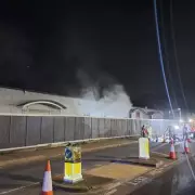 Major Fire Engulfs Derelict Buildings in Bexley, 60 Firefighters Deployed