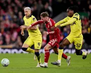 Tottenham's Fighting Spirit Earns Crucial Point Against Liverpool at Anfield