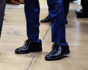 Trump's Footwear Control: How Oversized Shoes Symbolize Power Over Rubio, Vance