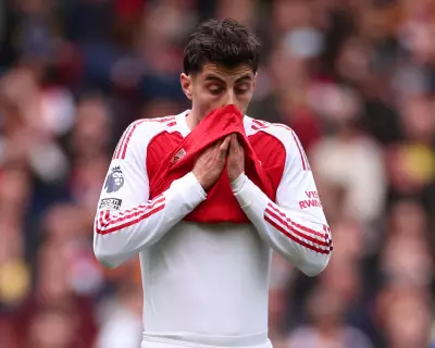 Arsenal's Title Hopes Staggered by Bournemouth Defeat: A Punch in the Face