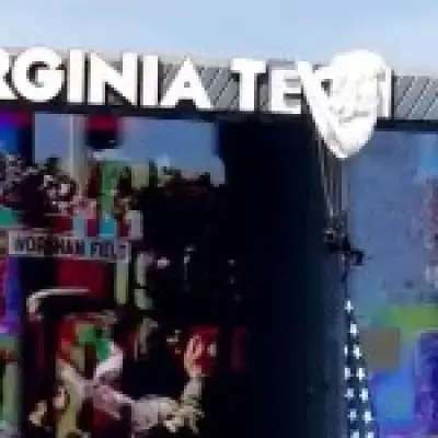 Skydiver Crashes into Scoreboard, Dangles at Virginia Tech Game