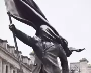 Banksy Confirms New London Statue of Man Blinded by Flag