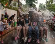 Global Photo Roundup: From Laos Water Fights to Coal-Powered Cars