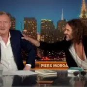 Piers Morgan Accuses Russell Brand of 'Inappropriately Tactile' Interview Behavior