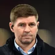 Steven Gerrard Dismisses Gary Neville's 'Ridiculous' Salah to Chelsea or Arsenal Theory