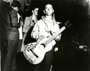 Woody Guthrie Exhibit at NYU Resonates with Anti-Fascist Protest in 2026