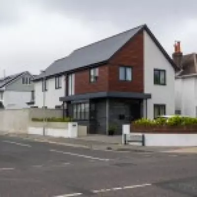 Dorset homeowner builds 7ft concrete 'Berlin Wall' outside £1m home, angers neighbours