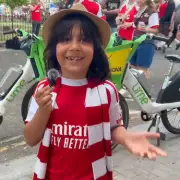 Arsenal fan, 9, 'very excited' at Premier League trophy parade with dad