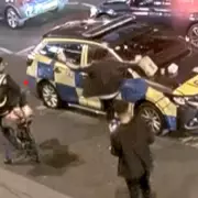 Man fined for eating takeaway on police car bonnet in London