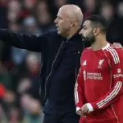 Rooney and Neville Split Over Salah's Final Liverpool Match After Slot Attack