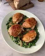 Spring Chicken Thighs with Peas, Mint, and Spring Onions Recipe