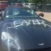 Vandal Smashes £200k Aston Martin, Sprays 'Cheater' at Golf Club