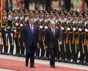 Xi and Putin Meet in Beijing Days After Trump's China Visit