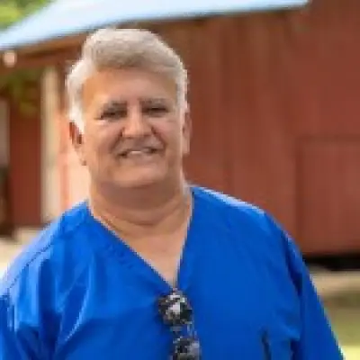 Dentist offers free global care where elephants and lions stroll by