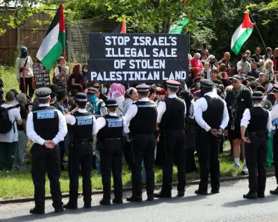 Police arrest 14 at rival protests over Israeli property event in London