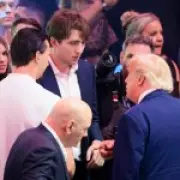 Barron Trump ditches slicked-back hair for laid-back new look at UFC event