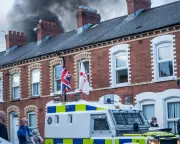 Belfast Riots Renew Scrutiny Over Loyalist Paramilitary Influence Amid Racial Violence