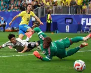 Brazil into last 16 as Martinelli strikes in stoppage time to break Japan hearts