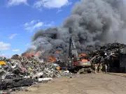 Dramatic South London scrap yard blaze: 100 tonnes of metal on fire