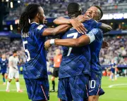 France thrash Iraq 4-0 to top World Cup Group I