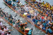 Giant Cranes and Dragon Boat Festival: Photos of the Day