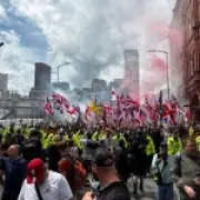 Hundreds of Britain First supporters march through Birmingham with flares