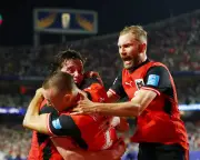 Late drama sends Austria and Algeria into World Cup knockouts, breaking Iran hearts