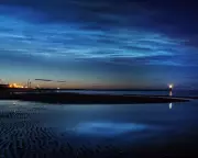 Noctilucent Clouds: Enigmatic Summer Phenomenon Shining from Edge of Space
